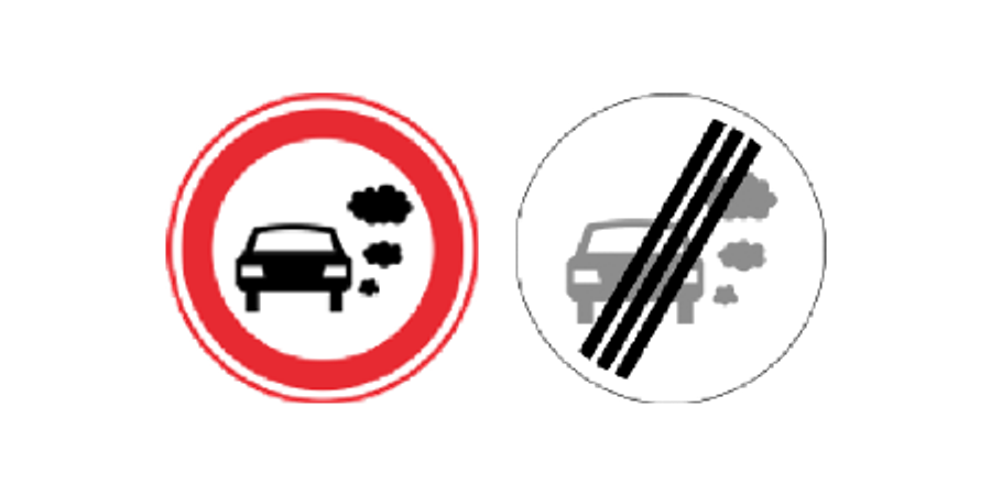 Links het bord gesloten vanwege emissie-eisen, rechts het einde van die geslotenverklaring